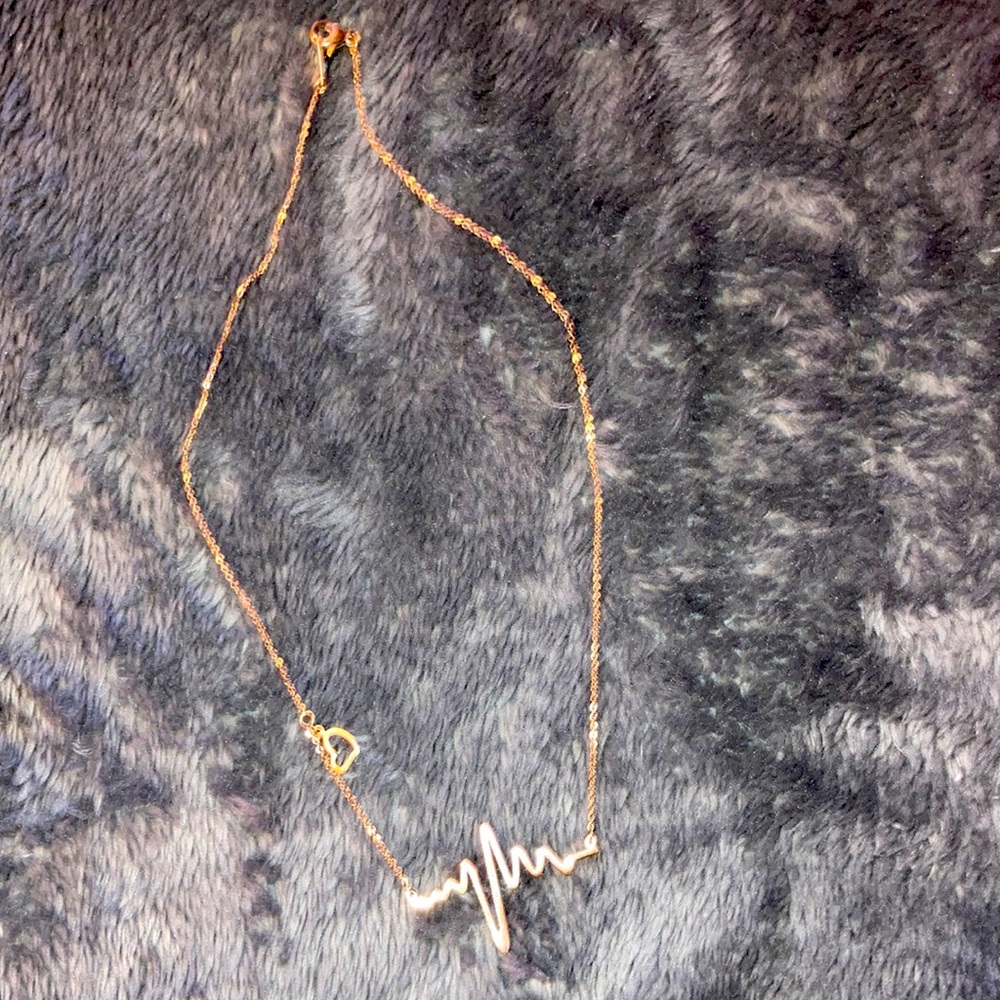 Heartbeat necklace gold